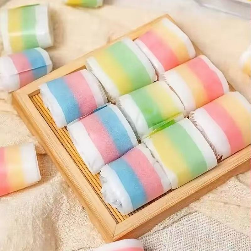 Yicaiduo fruit roll candy, colorful roll-shaped soft candy, available in mango, strawberry, grape and other assorted fruit flavors